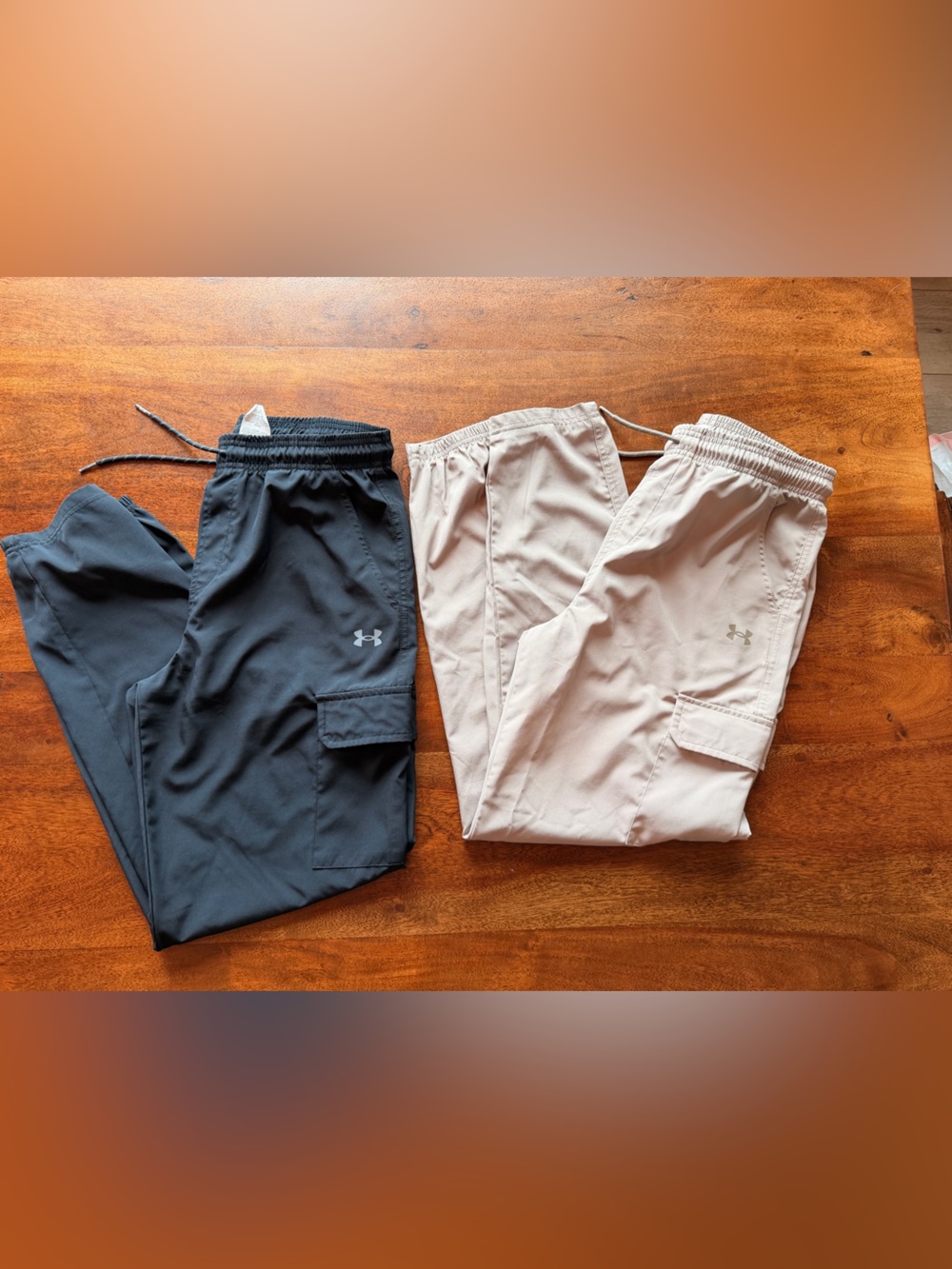 Two pair Boys Under Armour lightweight cargo joggers.